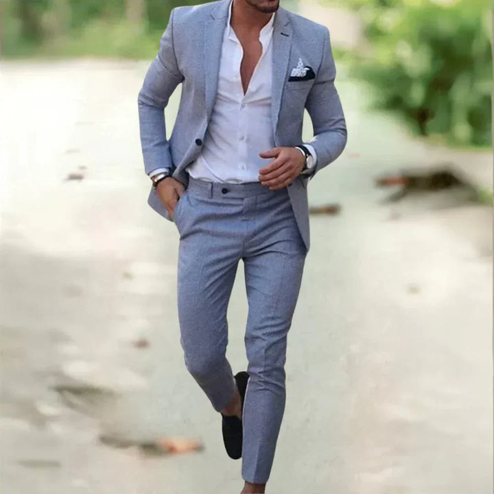 Versatile men's slim fit two-piece suit, embodying modern fashion for formal wear, business, or special occasions.