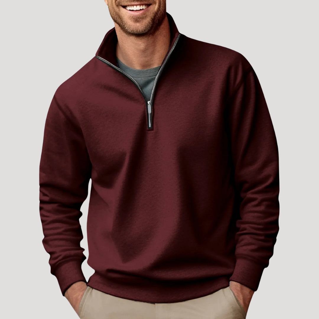 Stylish men's quarter-zip pullover sweater. Collar & ribbed trim, perfect for smart casual layering in fall.