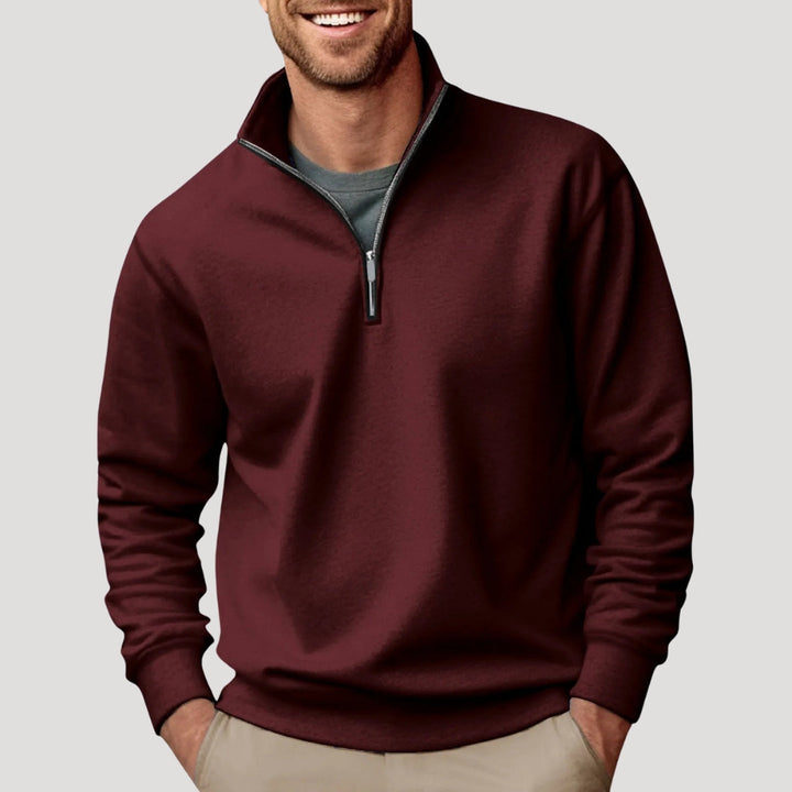 Stylish men's quarter-zip pullover sweater. Collar & ribbed trim, perfect for smart casual layering in fall.