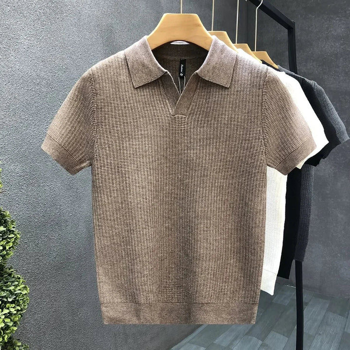 Men's soft knit polo shirt with open collar, short sleeves, & breathable fabric for smart casual everyday wear.