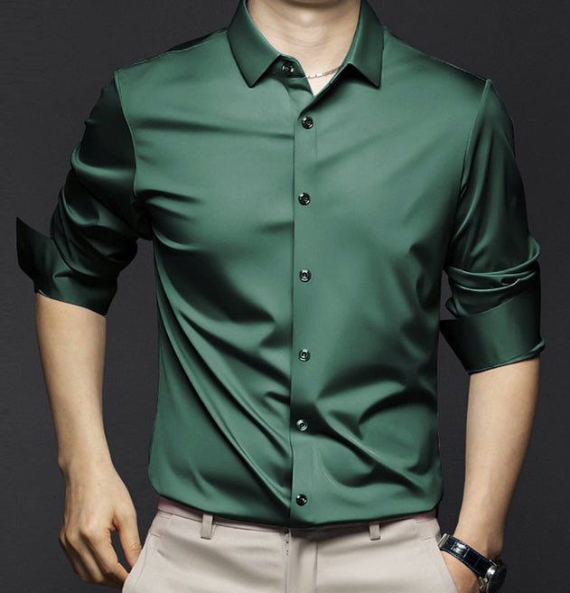 Detail of the collar and buttons on a crisp white men's stretch slim fit dress shirt.
