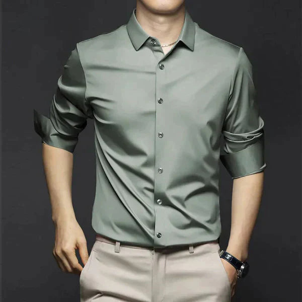 Three men's stretch slim fit dress shirts in white, blue, and black, showcased together.