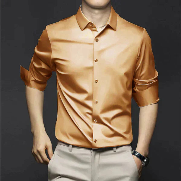 Lifestyle shot of a man wearing a slim fit dress shirt, demonstrating its versatility for men's apparel.
