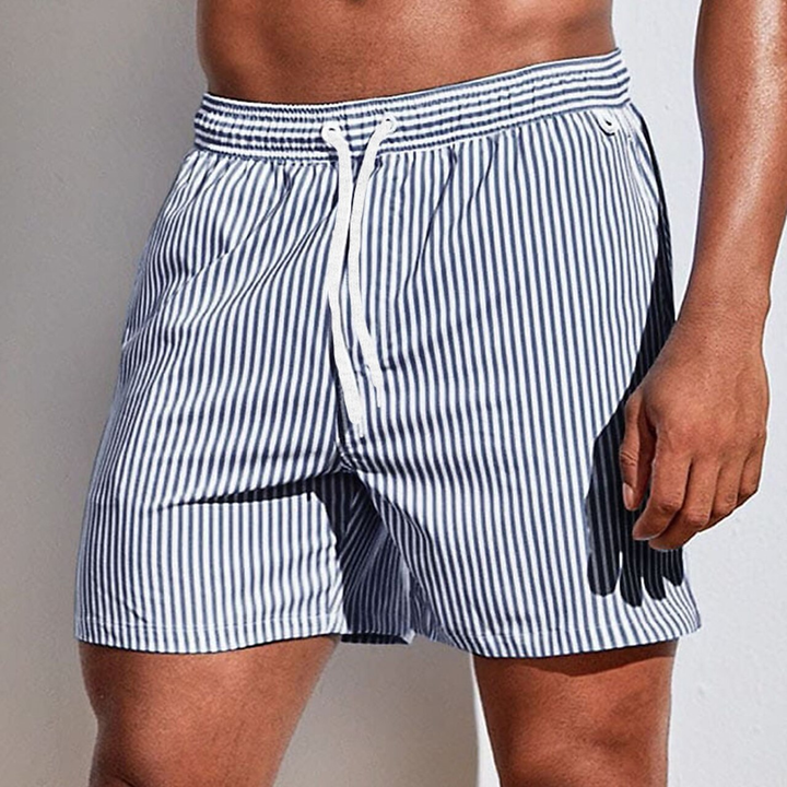 Men's casual striped swim trunks, essential summer fashion for beach or resort.