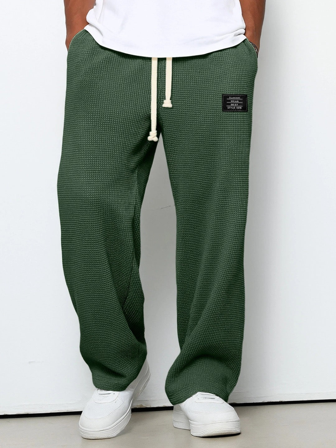 Men's Stuart loose fit drawstring chino pants in various colors, perfect for versatile casual everyday wear.