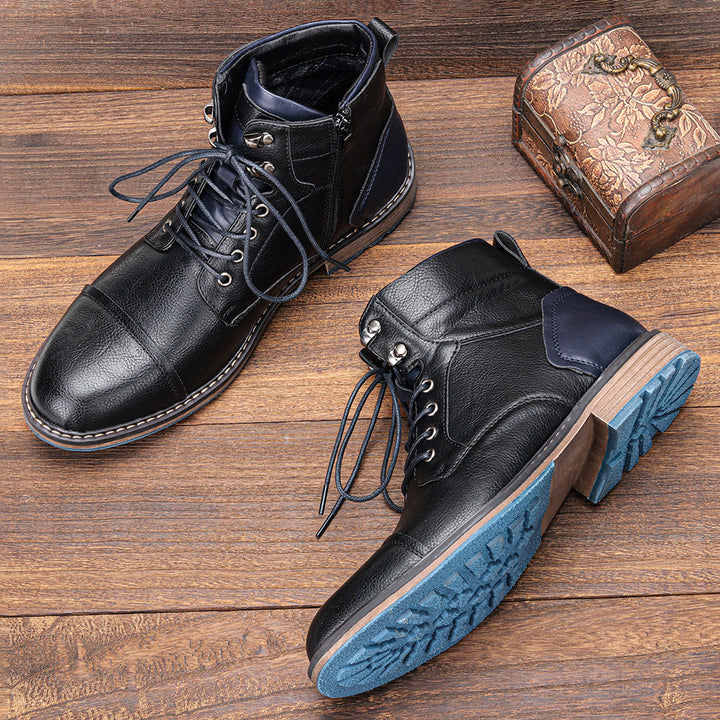 Close-up of a men's stylish cap toe ankle boot, featuring durable lace-up design.