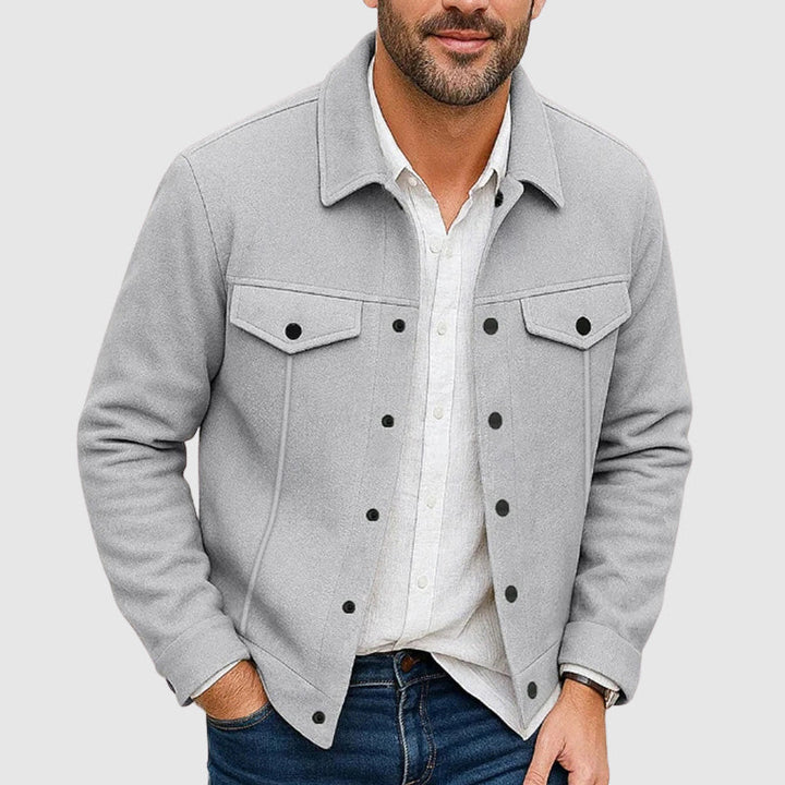 Close-up of a men's button-down shirt jacket fabric, showing texture & quality for a smart casual look.