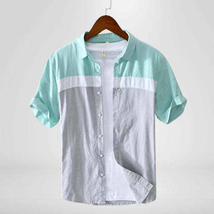 Stylish men's casual shirt featuring contrast panels, ideal for a modern summer look & relaxed comfort.