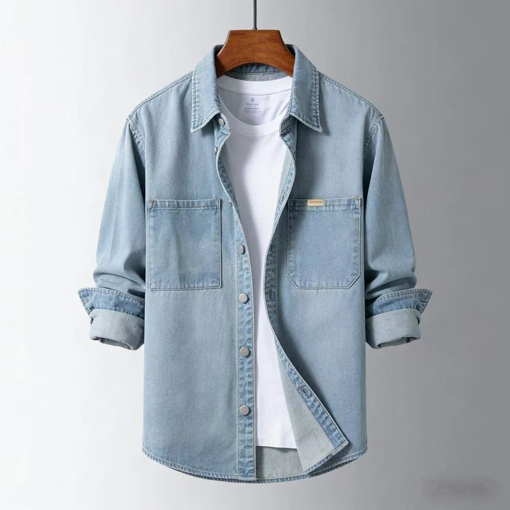 Casual men's blue button-down overshirt, perfect long sleeve layering piece.