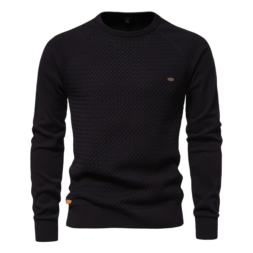Folded men's waffle knit crewneck sweater, showing its high-quality cotton blend material and texture