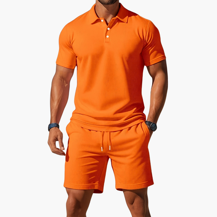 Comfortable men's polo shirt & drawstring shorts lounge set, ideal for vacation and resort wear.
