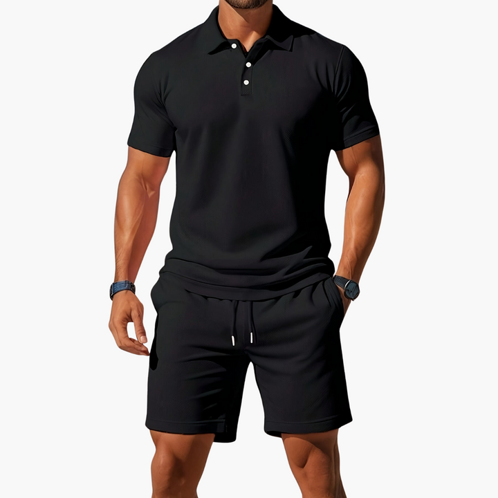 Men's vacation outfit: classic polo shirt paired with practical drawstring shorts for ultimate comfort.