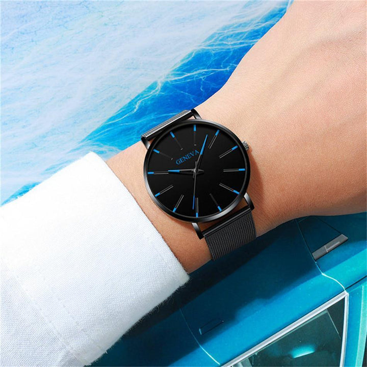 Stylish men's minimalist quartz watch, sustainable with a black vegan leather band. Ideal eco-friendly gift for him.