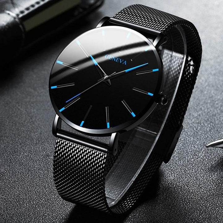 New men's sustainable watch featuring a minimalist dial, accurate quartz movement, and comfortable vegan black band.