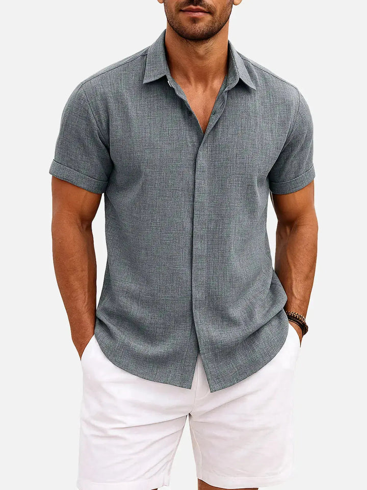 Collared men's short sleeve textured shirt, great for a laid-back summer look.