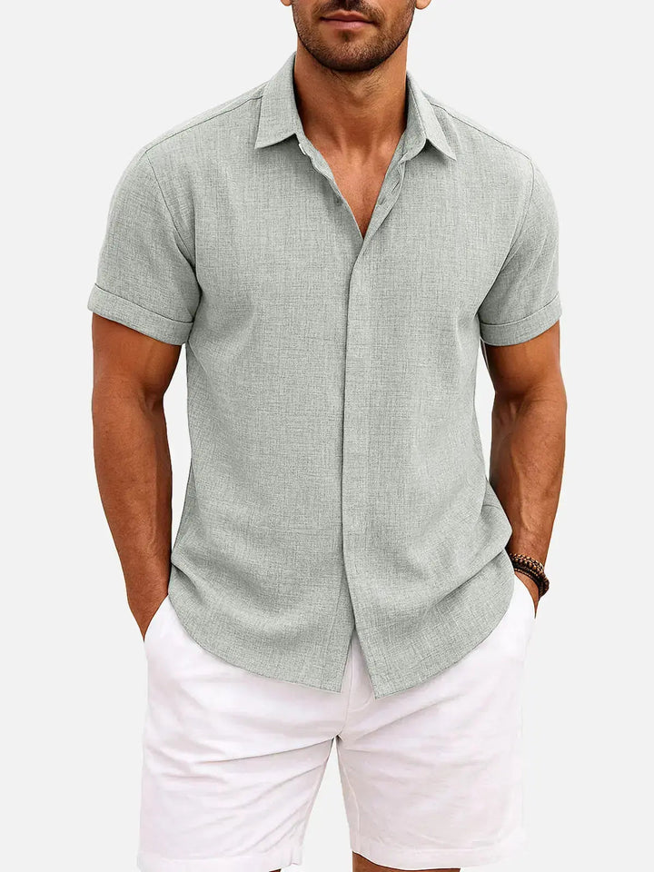 Fashionable men's textured short sleeve shirt for relaxed summer outings.