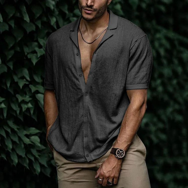 Men's button-down textured summer shirt. Short sleeve design, featuring a classic Cuban collar, for casual comfort.