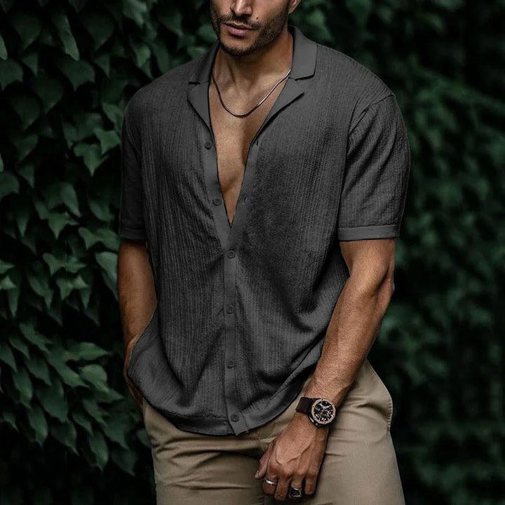 Men's button-down textured summer shirt. Short sleeve design, featuring a classic Cuban collar, for casual comfort.