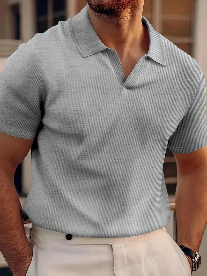 Stylish men's short sleeve polo with textured fabric, a slim fit shirt for versatile summer fashion and men's apparel.