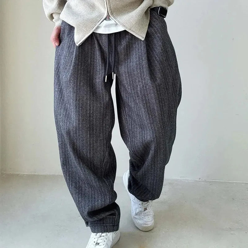 Comfortable brown Men's Urban Drift pants, perfect for casual wear. Adjustable fit for effortless streetwear style.