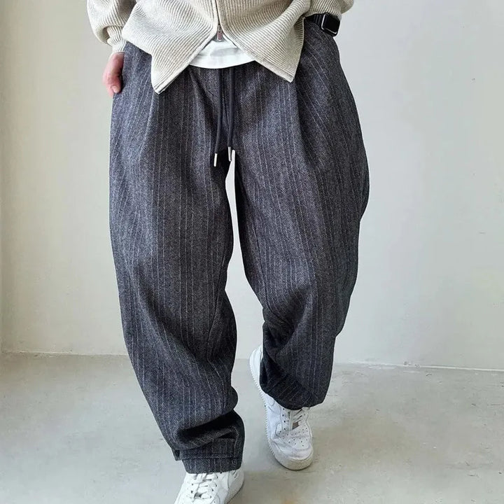Comfortable brown Men's Urban Drift pants, perfect for casual wear. Adjustable fit for effortless streetwear style.