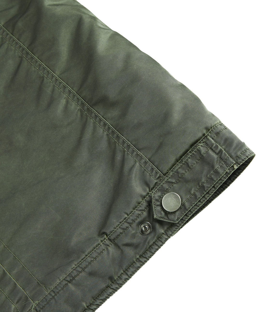 Man enjoying a walk outdoors wearing the comfortable, insulated men's military jacket in fall.