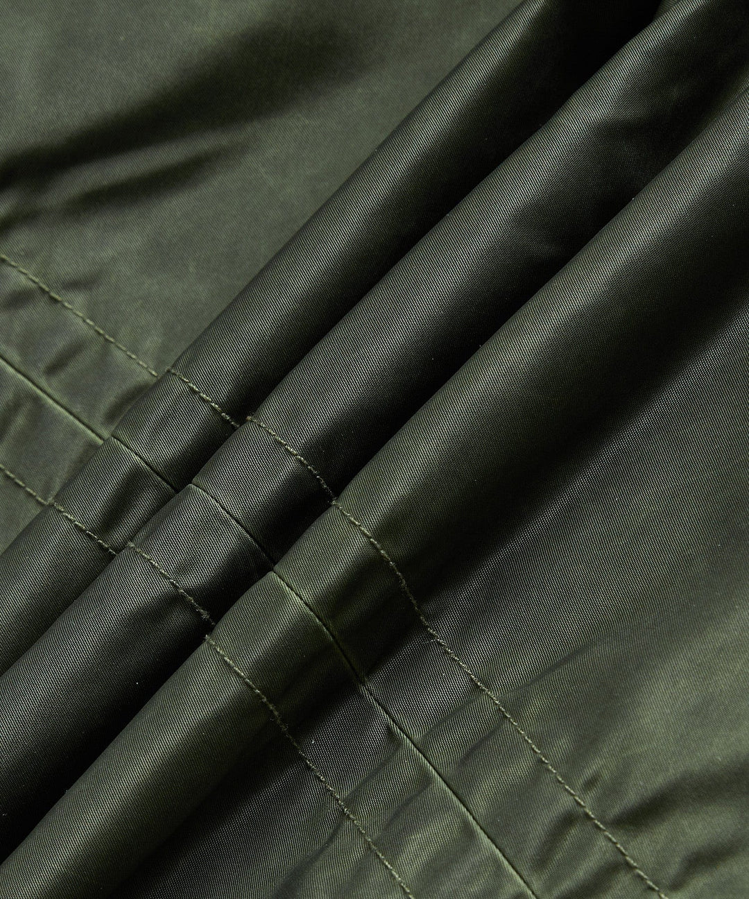 Close-up of the sleeve cuff on the men's tough urban jacket, adjustable and durable.