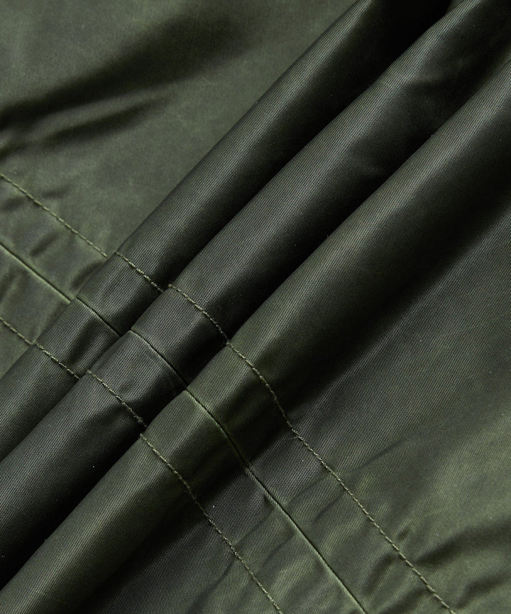 Close-up of the sleeve cuff on the men's tough urban jacket, adjustable and durable.