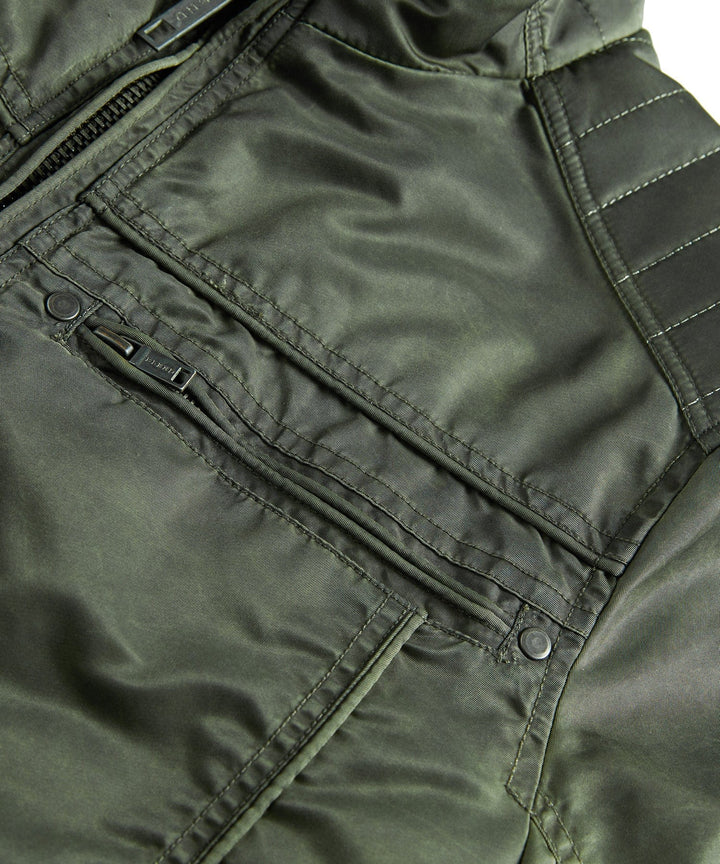 Side profile of the men's casual military jacket, highlighting its comfortable, adventure-ready design.