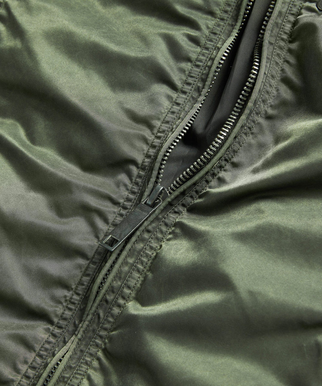 Hood detail of the men's military-inspired jacket, offering extra protection from elements.