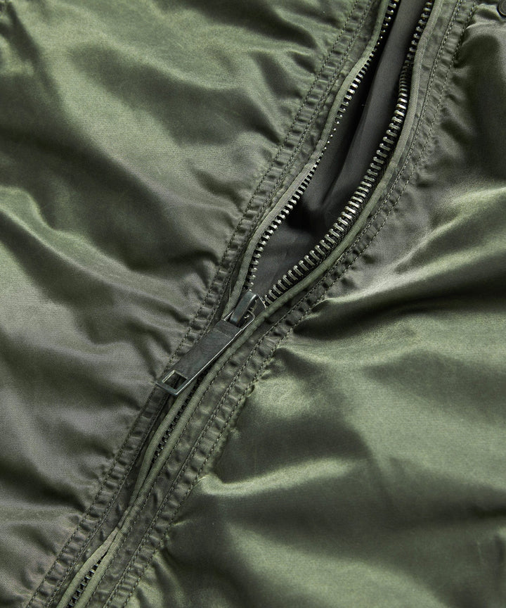 Hood detail of the men's military-inspired jacket, offering extra protection from elements.