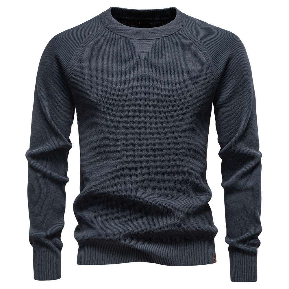 Front view of a white men's waffle knit long sleeve sweater, ideal for winter fashion.
