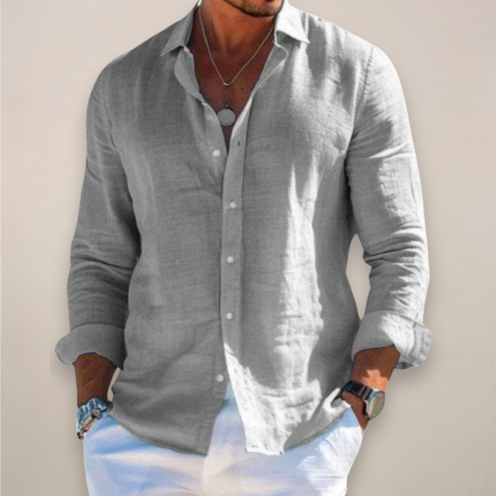 Men's versatile long sleeve button-up shirt in a solid color, perfect for casual or smart casual everyday wear.