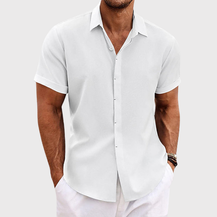 Relaxed fit men's casual short-sleeve shirt, a versatile essential for smart casual outfits.