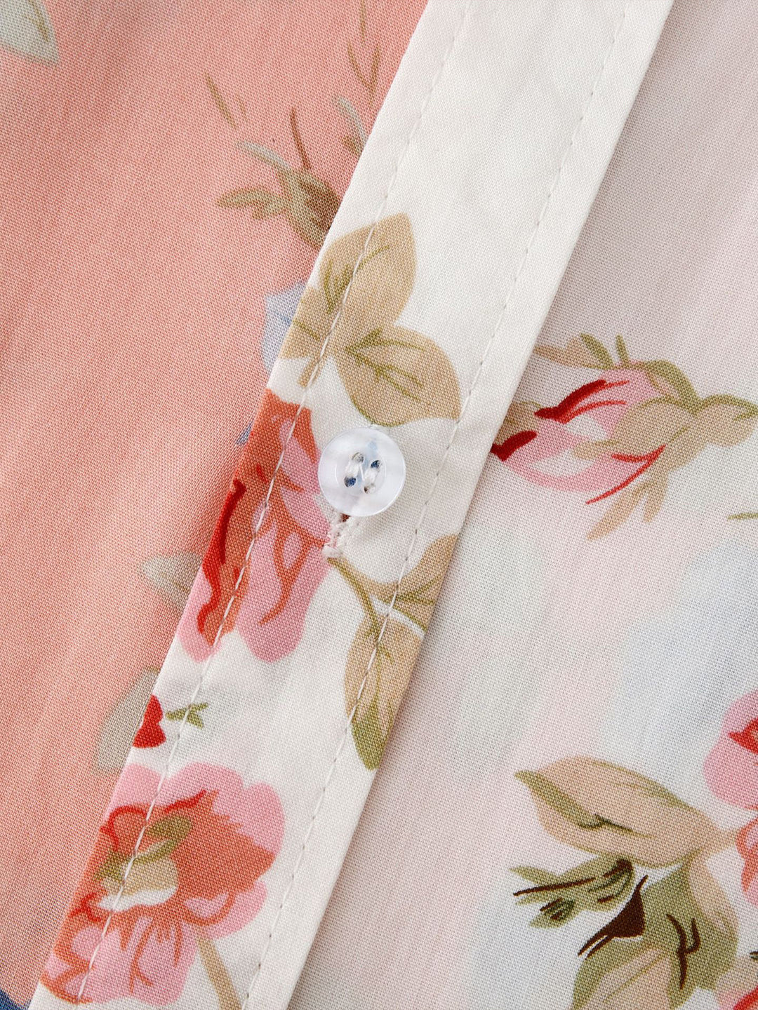 Men's floral button-down short sleeve shirt paired for a chic summer casual look.