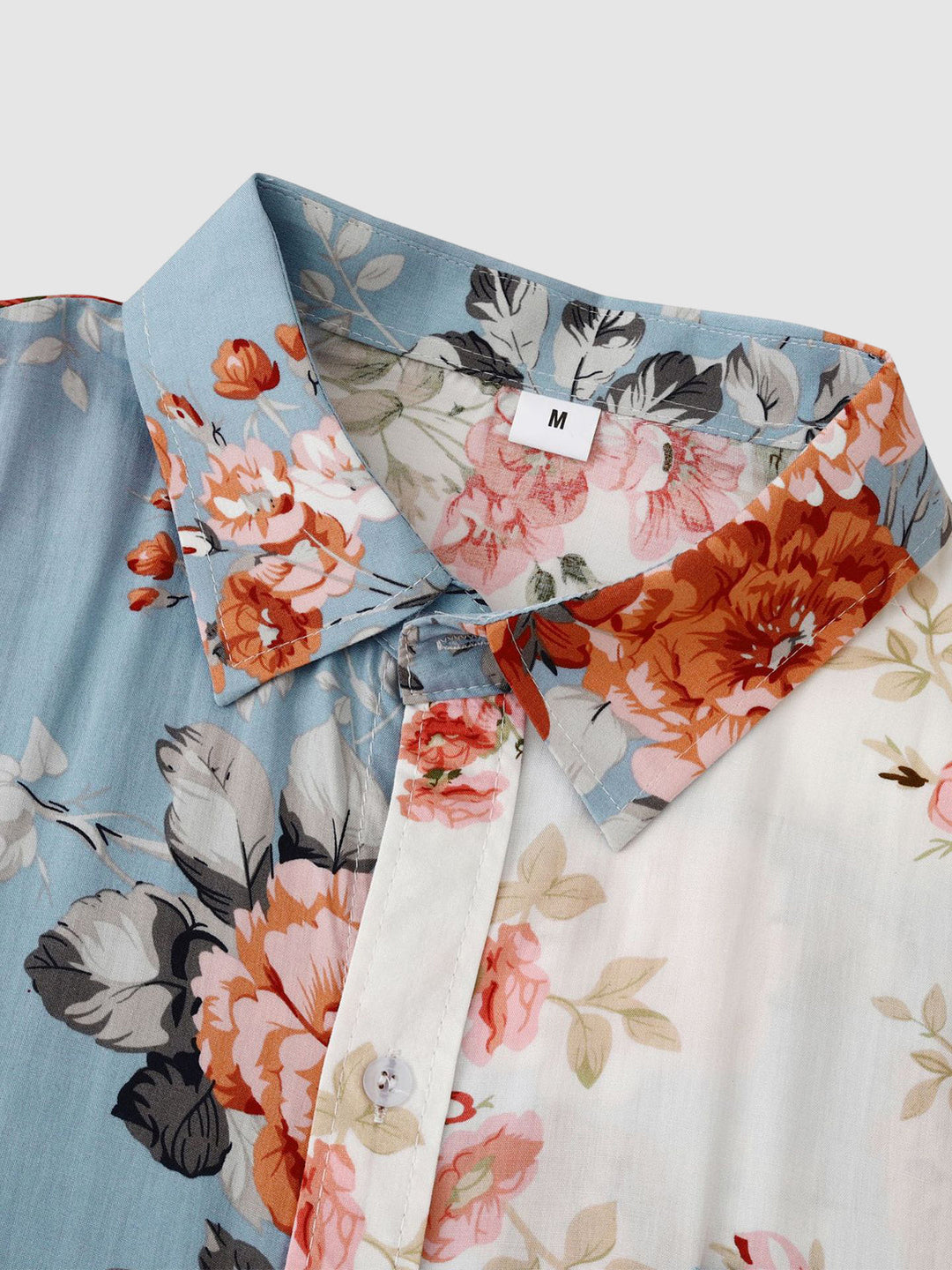 Men's vibrant floral short sleeve button-down shirt, ideal for beach or summer resort wear.