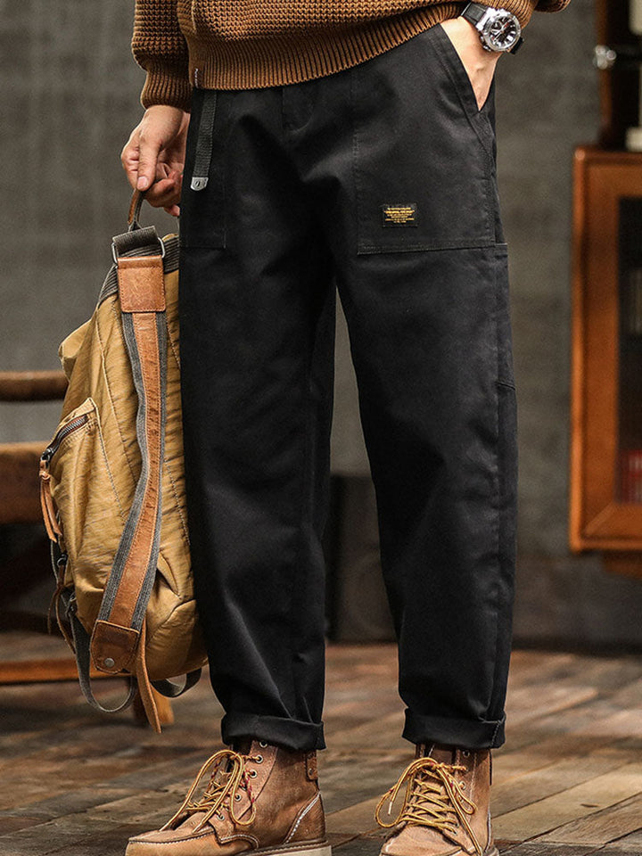 Men's vintage utility cargo pants with multiple pockets. Relaxed fit, great for casual & outdoor use.