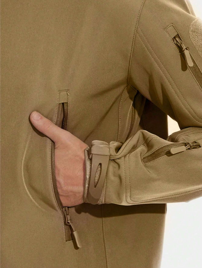 Men's outdoor apparel set: waterproof jacket & tactical pants, designed for rugged use.