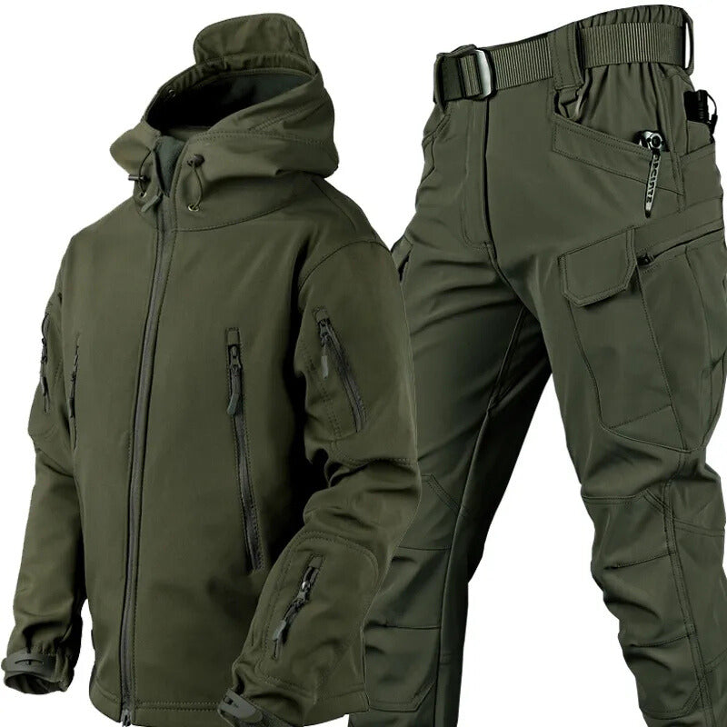 Rugged men's outdoor set featuring a waterproof jacket & durable tactical pants for exploration.