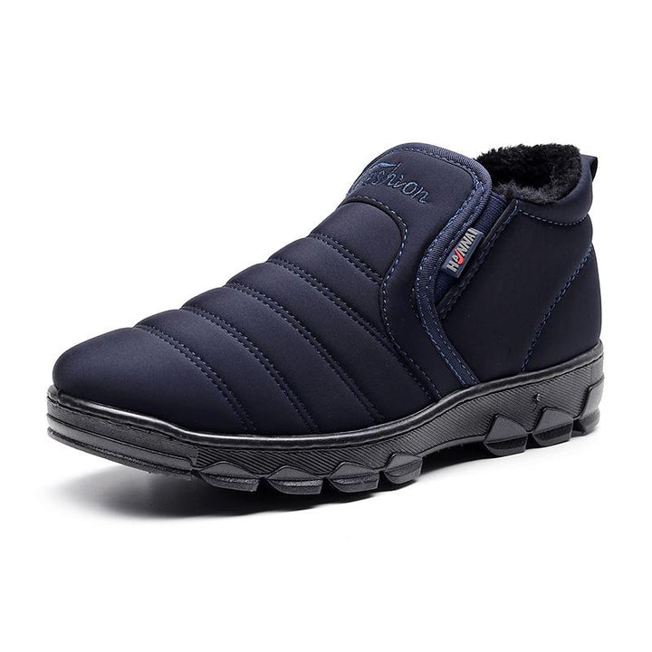 Top-down view of men's warm black winter boots, highlighting waterproof design and velvet comfort