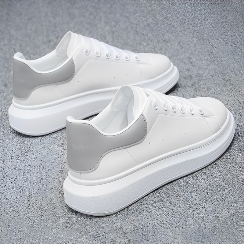 Comfortable men's white platform casual sneakers. Lace-up footwear with a stylish chunky sole for daily wear.