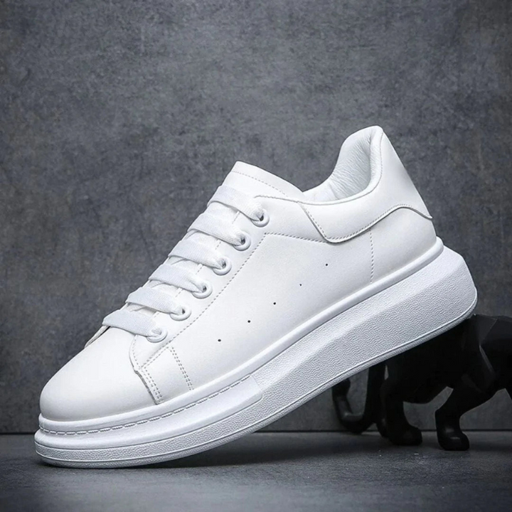Men's white lace-up platform casual sneakers. Stylish and comfortable everyday footwear with a chunky sole.