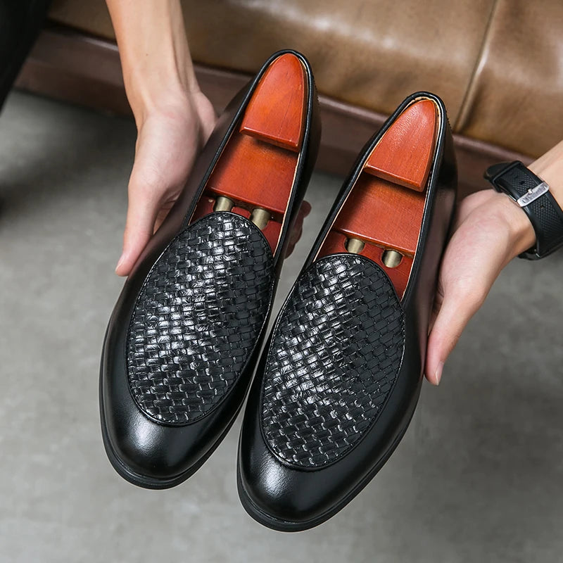 Stylish men's leather loafers, black woven design, ideal for comfortable daily footwear