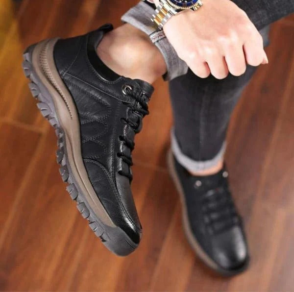 Side view of men's brown orthopedic shoe, showcasing its modern casual style.