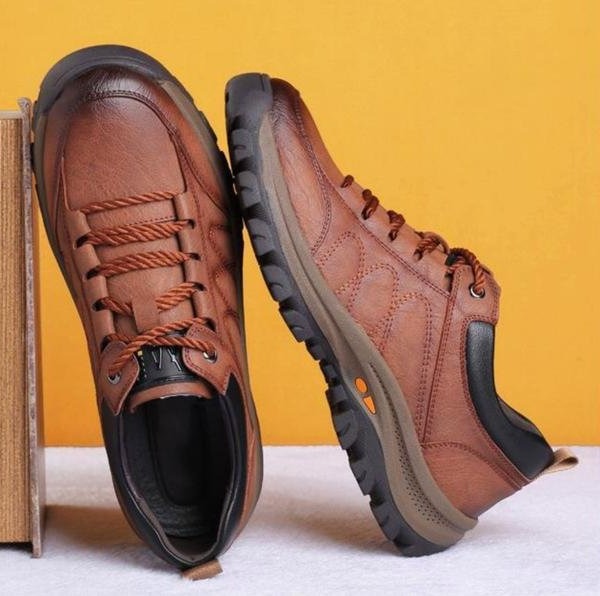 Detail shot of the interior comfort of men's brown orthopedic shoes.