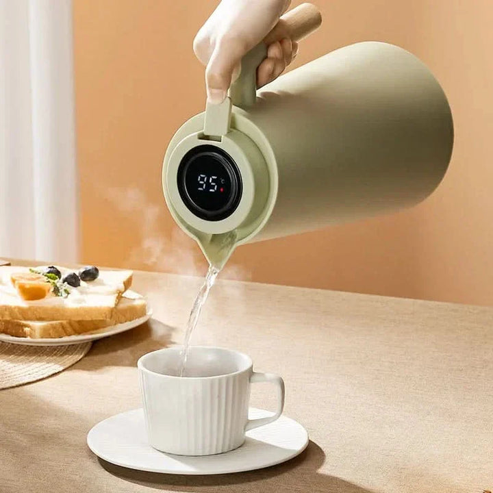 Modern 1L thermal carafe with LED temperature display, perfect for hot coffee or cold drinks.