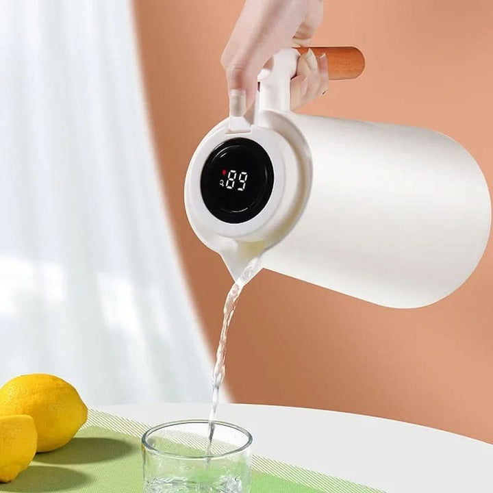 Unisex thermal carafe, a modern office essential & home dining beverage holder with temp display.