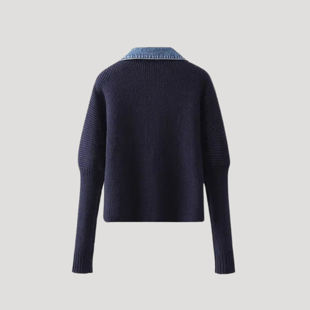 Close-up of buttons on a women's navy layered cardigan jacket, highlighting quality and style.