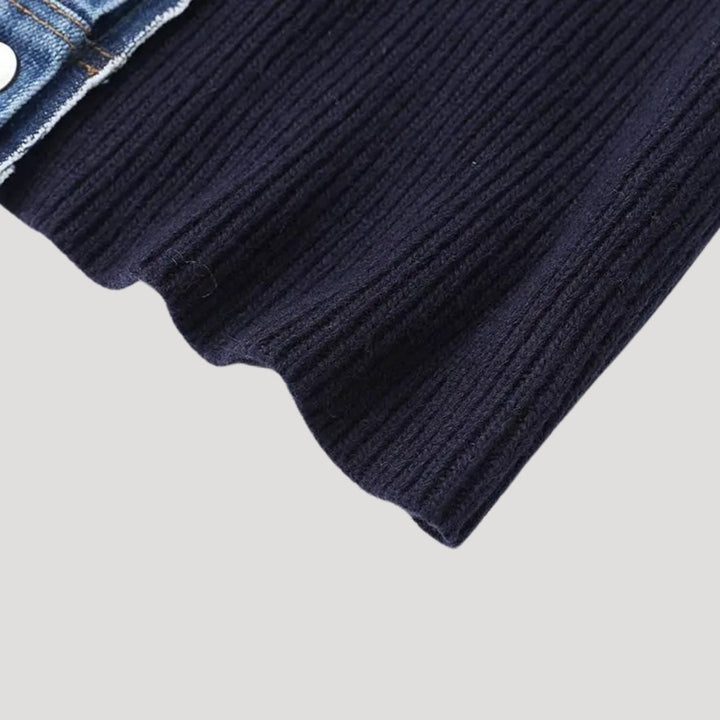 Stylish women's navy layered button cardigan jacket folded, showcasing fabric and design.