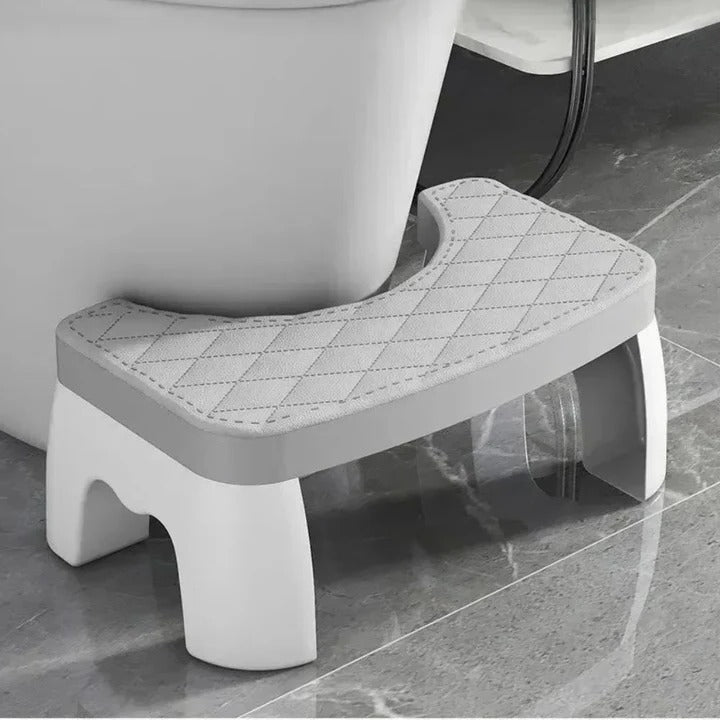 Non-slip bathroom toilet squat stool for comfortable, healthy posture. Ergonomic squatting aid.